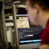 Student working in TECH Center Media Studio working on Video Production