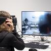 Student using Virtual Reality Simulation Station in Charles Library 